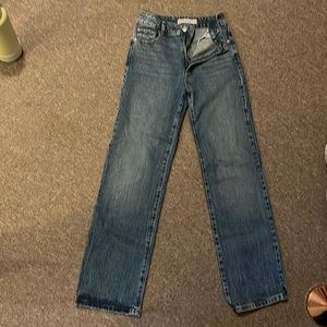 Size 03 or 26 high rise garage blue jeans.